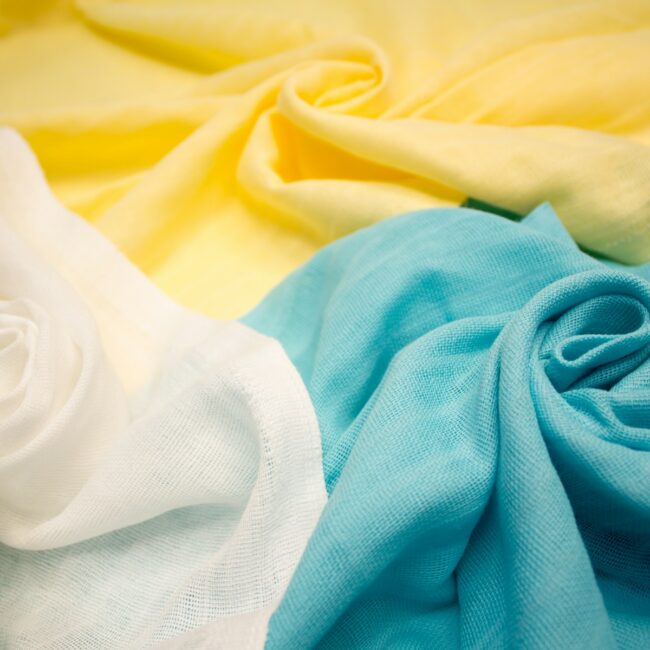 white textile on blue textile